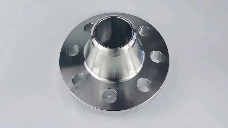 Integral welded flange