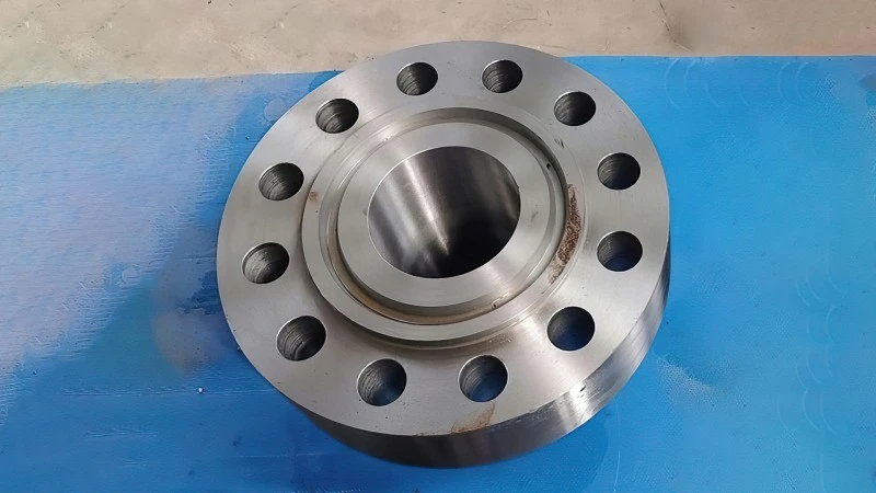 Integrated welded flange