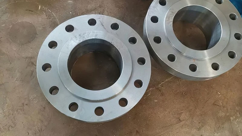 Integral welded flange