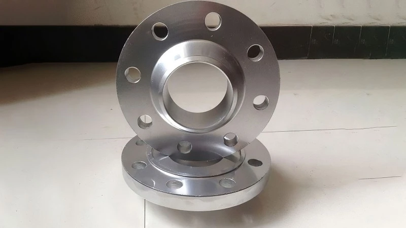 Integral welded flange