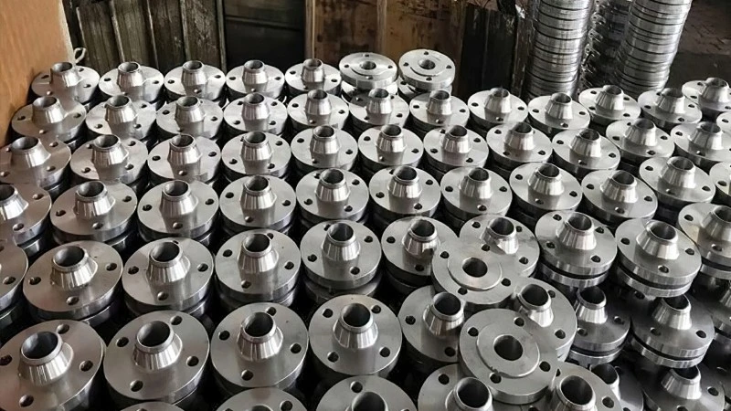 Integral welded flange